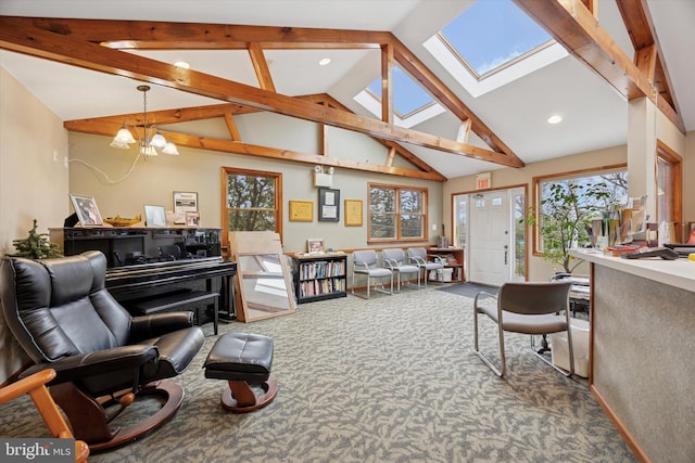 living room featuring high vaulted ceiling, an inviting chandelier, a skylight, beamed ceiling, and carpet flooring