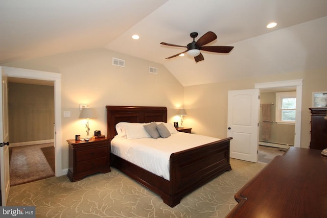 bedroom featuring visible vents, light colored carpet, baseboard heating, and vaulted ceiling