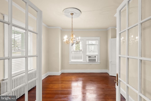 2621 2nd Rd N, Arlington, VA 22201 - unfurnished dining area featuring baseboards, wood finished floors, ornamental molding, and a chandelier