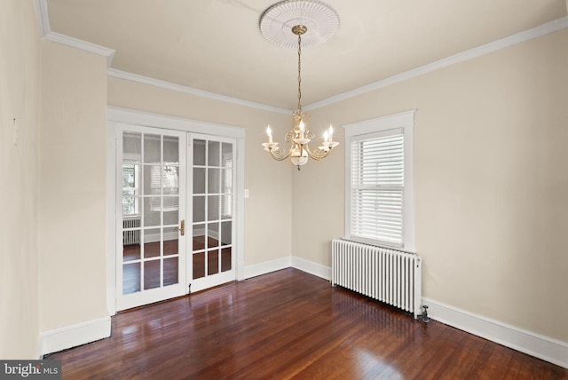 2621 2nd Rd N, Arlington, VA 22201 - unfurnished room featuring baseboards, radiator heating unit, a notable chandelier, and wood-type flooring