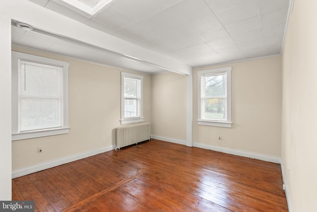 2621 2nd Rd N, Arlington, VA 22201 - unfurnished room with hardwood / wood-style flooring, ornamental molding, baseboards, and radiator