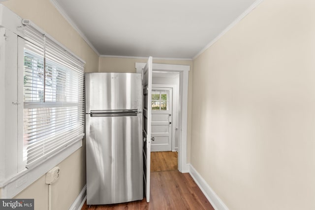 2621 2nd Rd N, Arlington, VA 22201 - kitchen with baseboards, wood finished floors, ornamental molding, and freestanding refrigerator