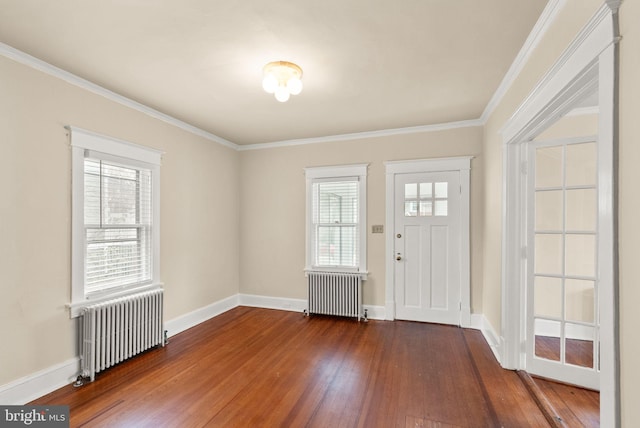2621 2nd Rd N, Arlington, VA 22201 - foyer entrance with ornamental molding, radiator, and wood finished floors