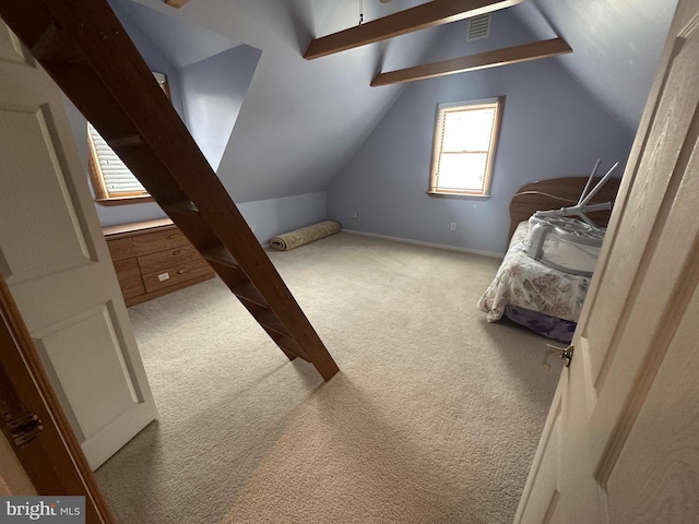 additional living space with vaulted ceiling and carpet