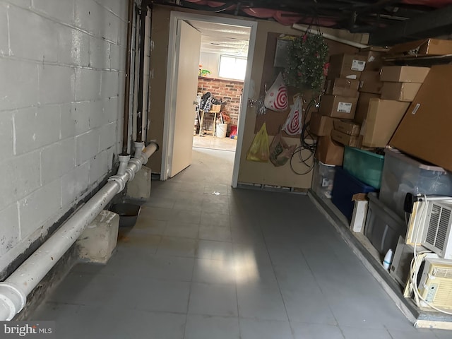 basement with concrete block wall