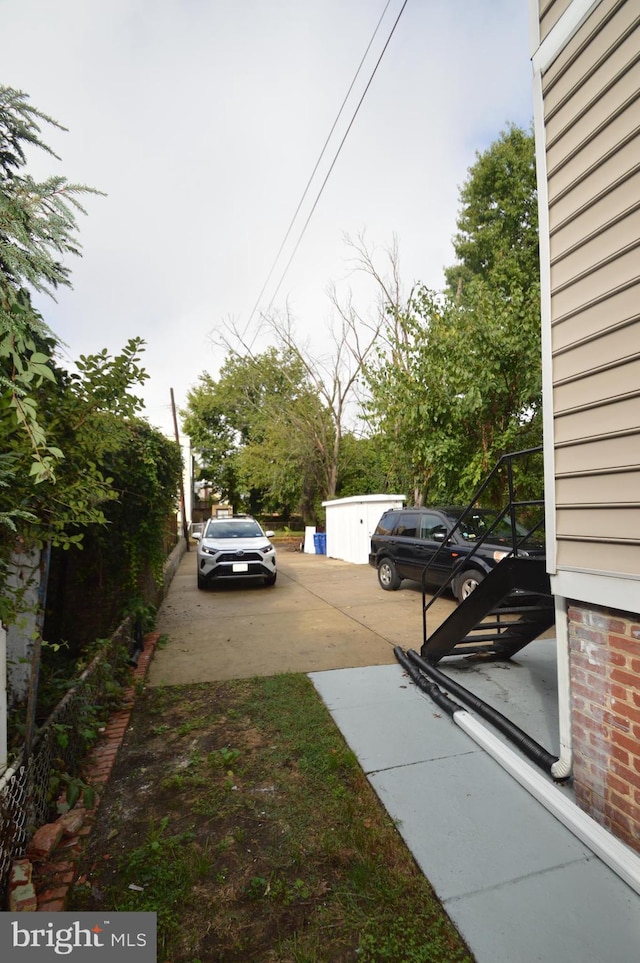 view of road with driveway