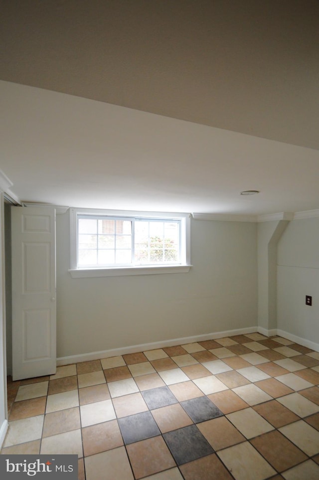 below grade area with a healthy amount of sunlight and baseboards