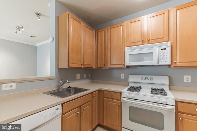 kitchen with visible vents, ornamental molding, a sink, white appliances, and light countertops