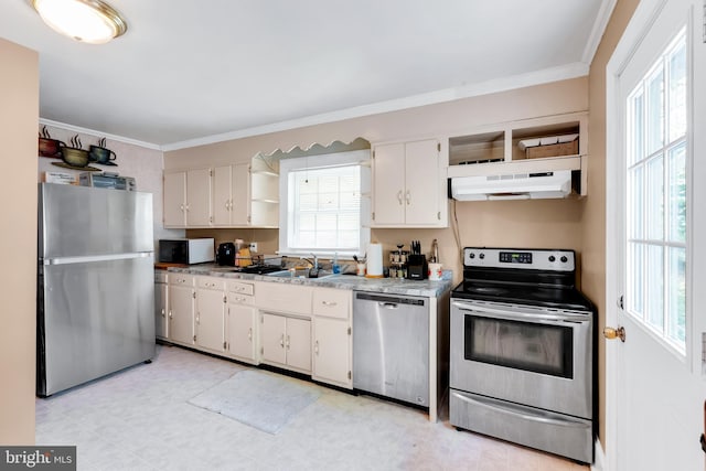 kitchen with open shelves, a sink, appliances with stainless steel finishes, under cabinet range hood, and ornamental molding