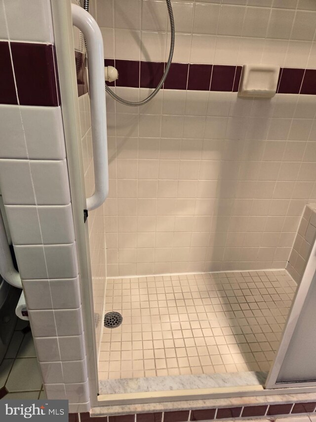 bathroom with a stall shower