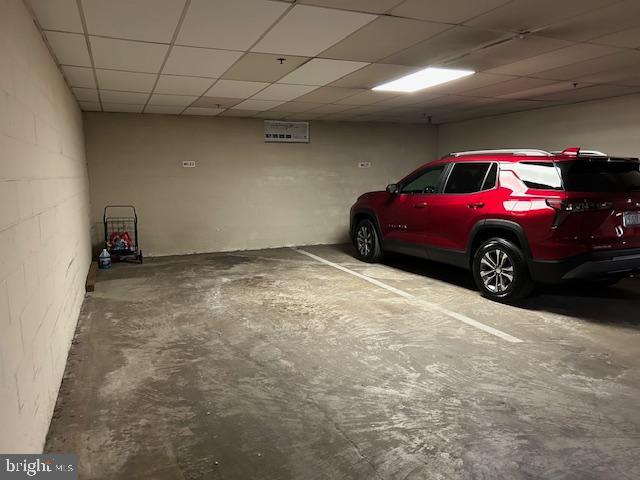 garage featuring concrete block wall