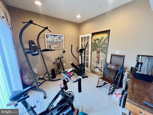 exercise room featuring recessed lighting and carpet