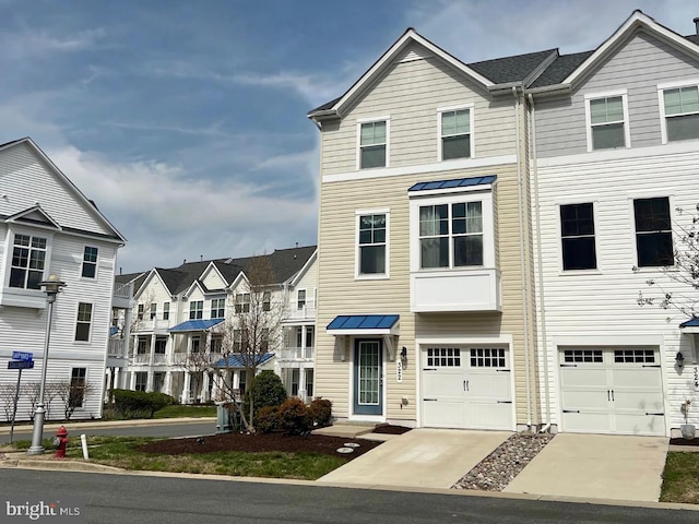 322 Shipyard Dr Unit 82, Cambridge, MD 21613 - multi unit property with an attached garage, a residential view, and concrete driveway