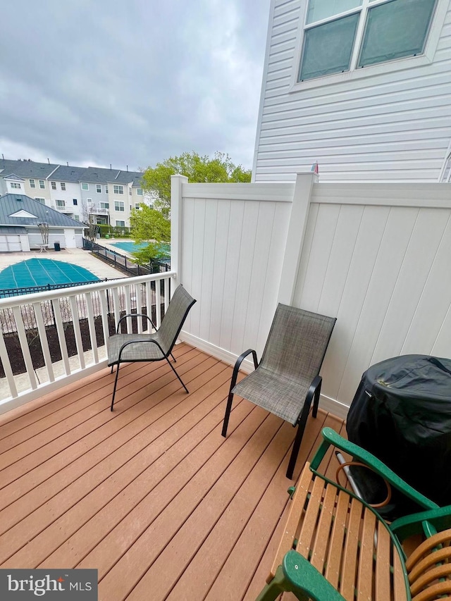 322 Shipyard Dr Unit 82, Cambridge, MD 21613 - deck featuring a grill and a residential view