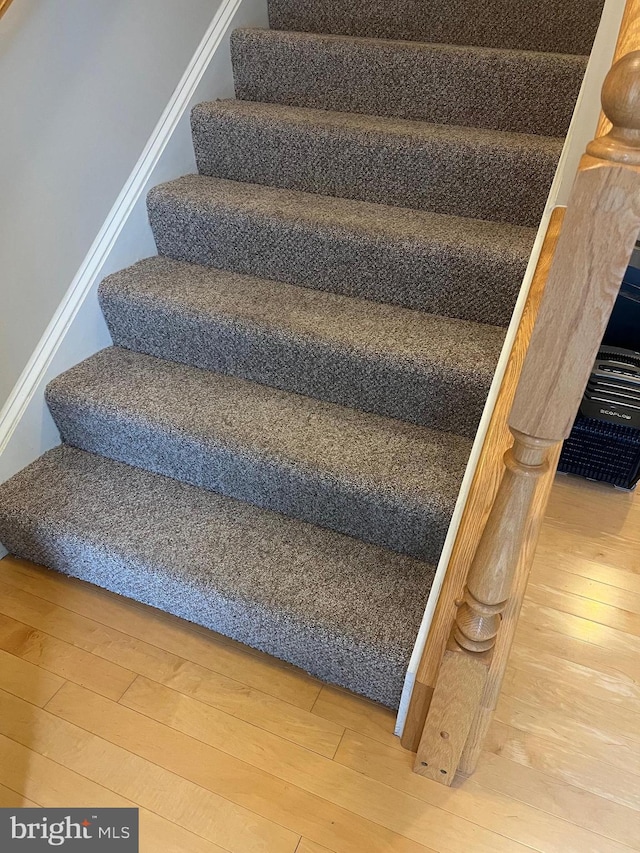 322 Shipyard Dr Unit 82, Cambridge, MD 21613 - stairway with wood-type flooring