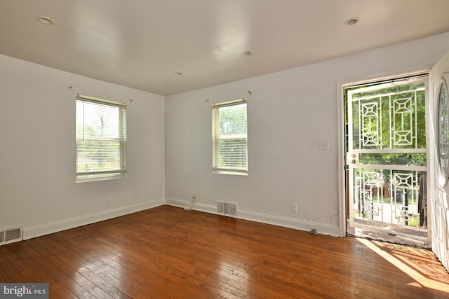 3910 Billings Pl, Capitol Heights, MD 20743 - empty room with wood-type flooring, healthy amount of natural light, and baseboards