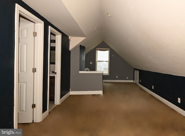 3910 Billings Pl, Capitol Heights, MD 20743 - additional living space with lofted ceiling, baseboards, and carpet flooring