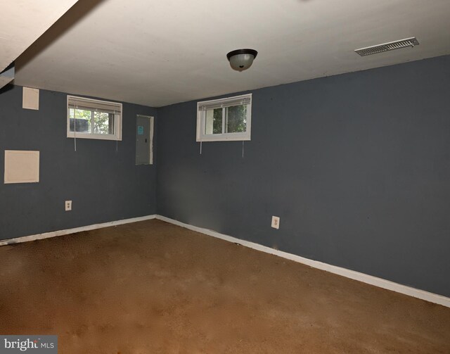 3910 Billings Pl, Capitol Heights, MD 20743 - below grade area featuring baseboards, electric panel, and dark carpet