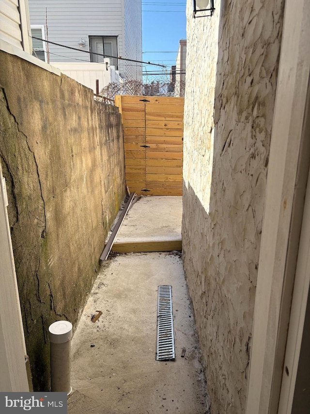 view of patio / terrace with visible vents and fence