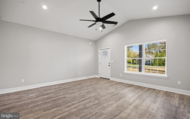 29345 Greenfield, Trappe, MD 21673 - unfurnished living room featuring ceiling fan, wood finished floors, high vaulted ceiling, recessed lighting, and baseboards
