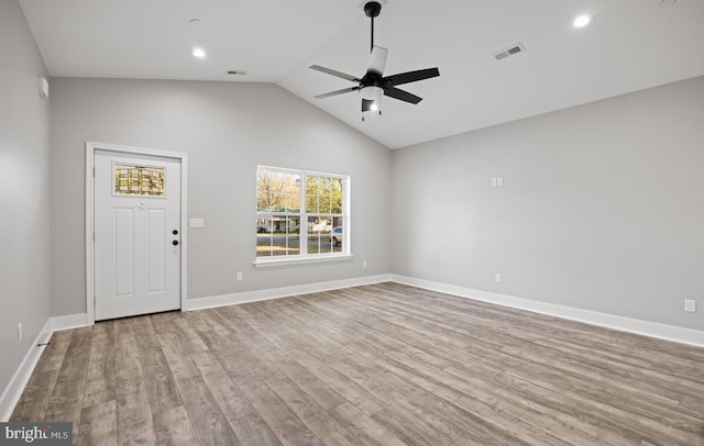 29345 Greenfield, Trappe, MD 21673 - unfurnished living room with ceiling fan, wood finished floors, baseboards, recessed lighting, and high vaulted ceiling