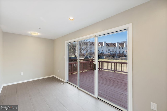 entryway featuring baseboards