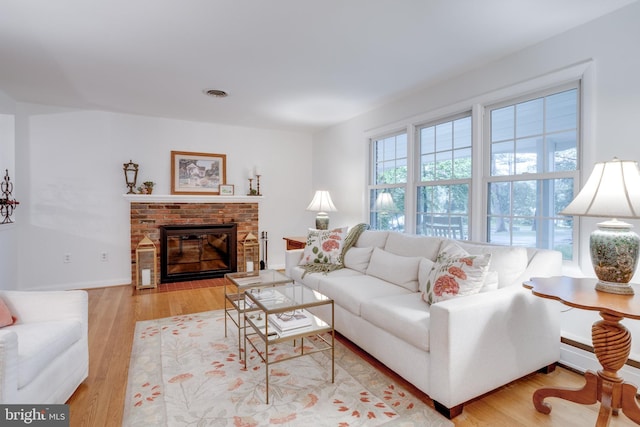 8605 Virginia Ave, Annandale, VA 22003 - living area with wood finished floors and a fireplace