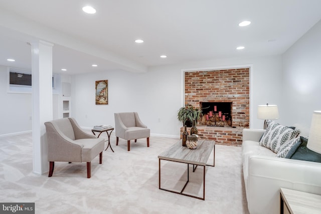 8605 Virginia Ave, Annandale, VA 22003 - living area featuring light carpet, recessed lighting, a brick fireplace, baseboards, and built in shelves