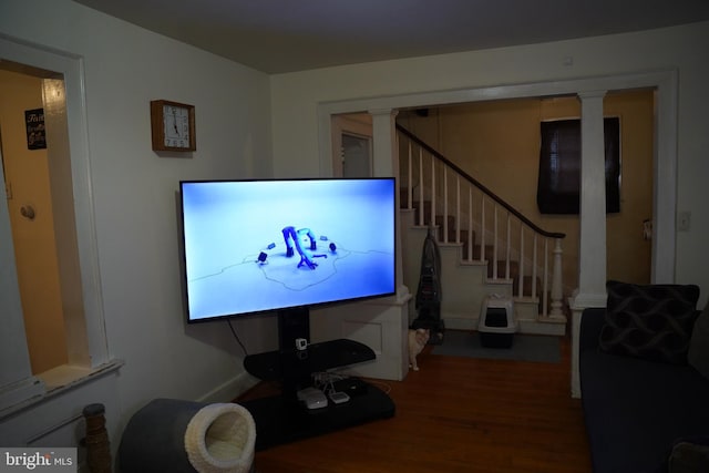 185 Middleway, Inwood, WV 25428 - living room with decorative columns, wood finished floors, and stairs