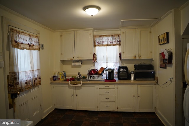 185 Middleway, Inwood, WV 25428 - kitchen with white cabinetry, light countertops, baseboards, and a sink