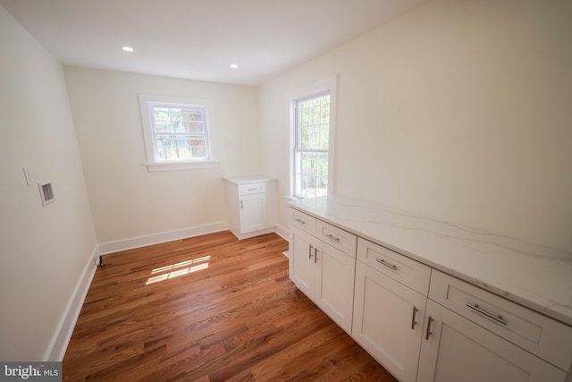 11 Hendrickson, Lawrenceville, NJ 08648 - unfurnished room with baseboards, recessed lighting, light wood-style floors, and a healthy amount of sunlight
