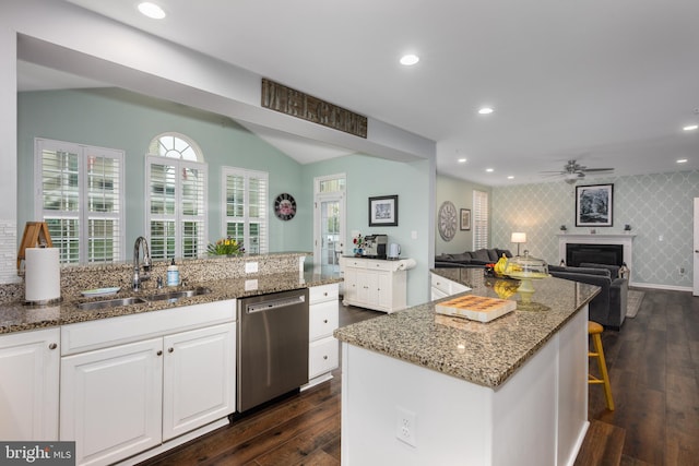 10437 Windlass Run Rd, Baltimore, MD 21220 - kitchen with ceiling fan, stainless steel dishwasher, stone counters, a sink, and open floor plan