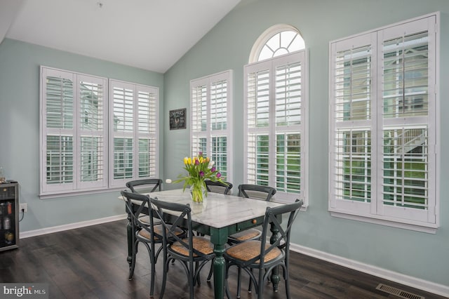 10437 Windlass Run Rd, Baltimore, MD 21220 - dining space featuring dark wood-style floors, visible vents, a healthy amount of sunlight, and lofted ceiling