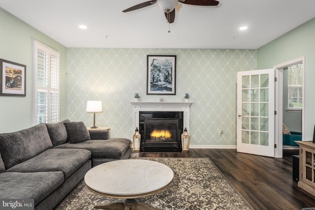 10437 Windlass Run Rd, Baltimore, MD 21220 - living room with a fireplace with flush hearth, wood finished floors, wallpapered walls, and a healthy amount of sunlight