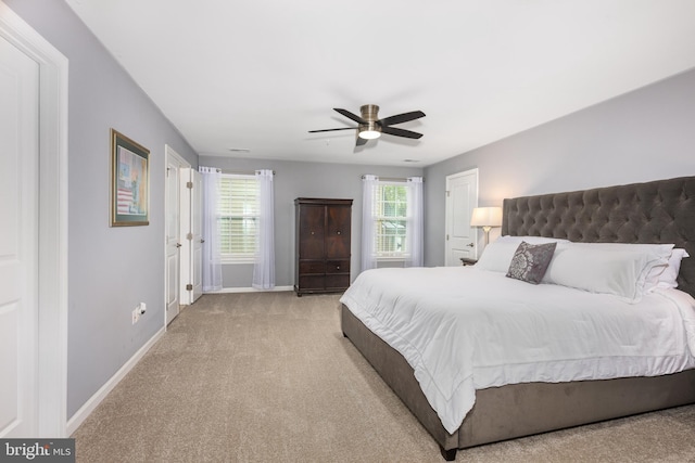 10437 Windlass Run Rd, Baltimore, MD 21220 - carpeted bedroom with ceiling fan and baseboards