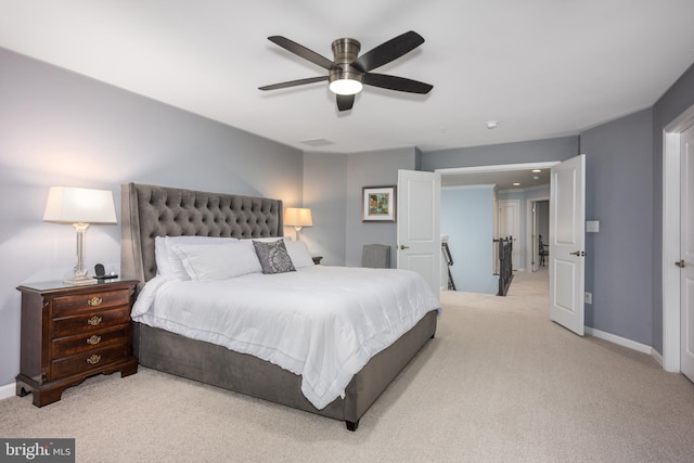 10437 Windlass Run Rd, Baltimore, MD 21220 - bedroom featuring light carpet, baseboards, and a ceiling fan