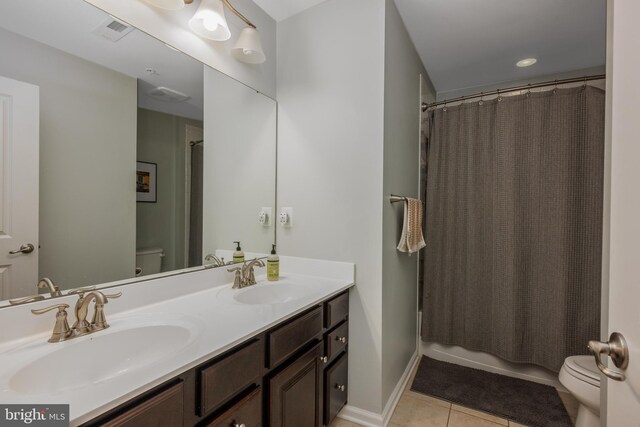 10437 Windlass Run Rd, Baltimore, MD 21220 - full bath with tile patterned flooring, visible vents, a sink, and toilet