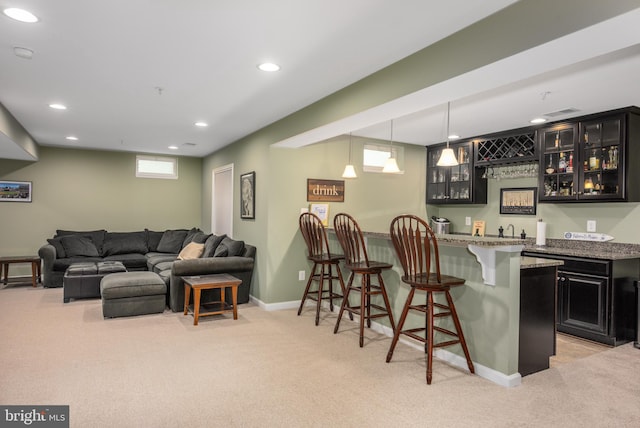 10437 Windlass Run Rd, Baltimore, MD 21220 - living area with light carpet, recessed lighting, indoor wet bar, and baseboards