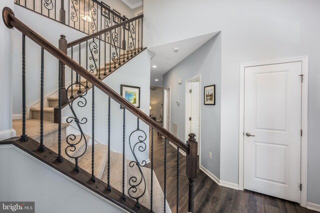 10437 Windlass Run Rd, Baltimore, MD 21220 - staircase with baseboards, recessed lighting, a high ceiling, and wood finished floors