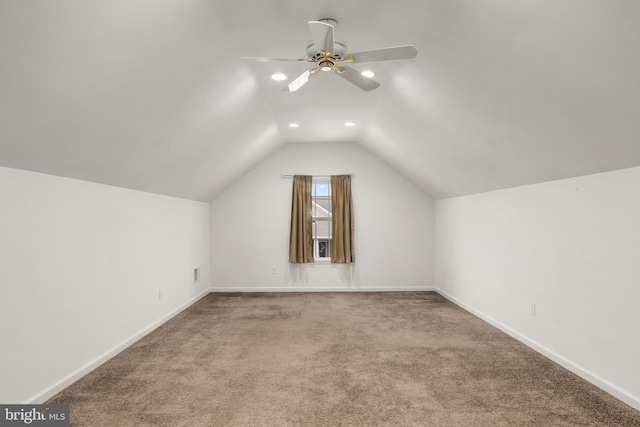 additional living space with baseboards, carpet, vaulted ceiling, recessed lighting, and a ceiling fan