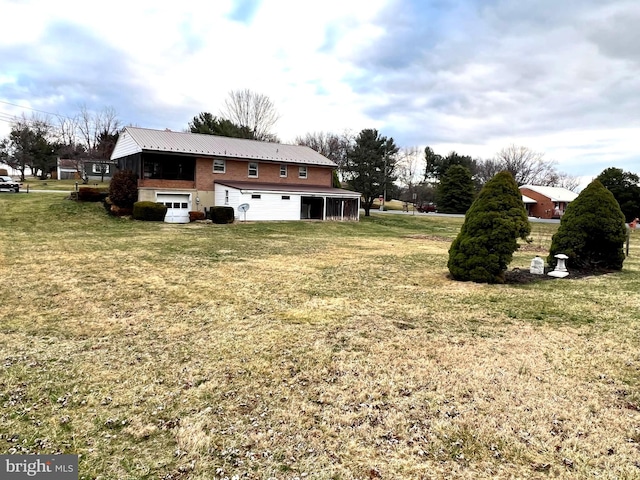 view of yard with a garage