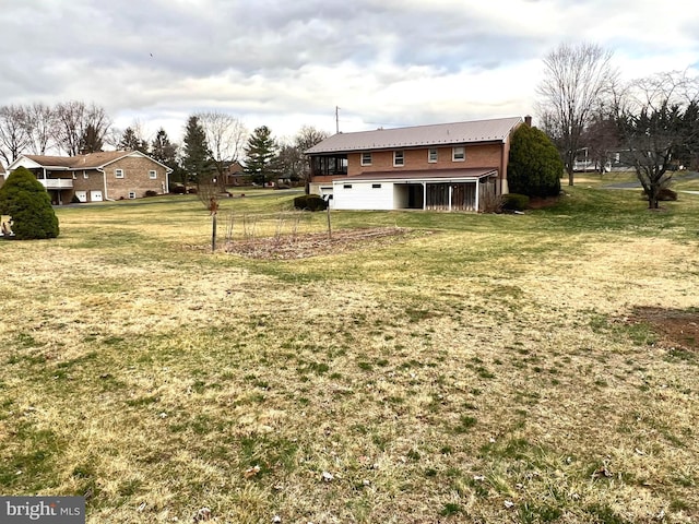 view of yard with an attached garage