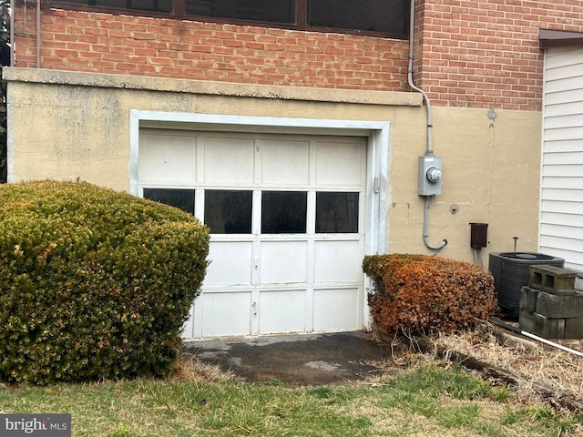 garage featuring central AC unit