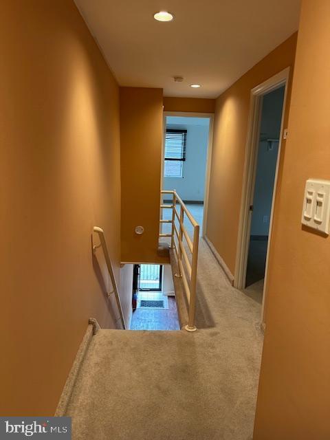 stairs with recessed lighting, baseboards, carpet floors, and a healthy amount of sunlight