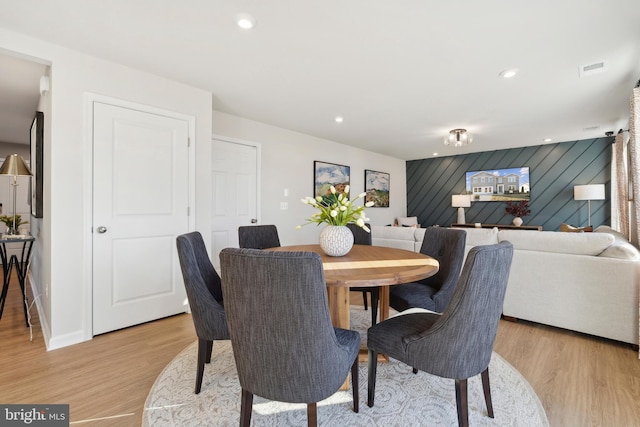 dining room featuring visible vents, recessed lighting, light wood-style floors, and baseboards