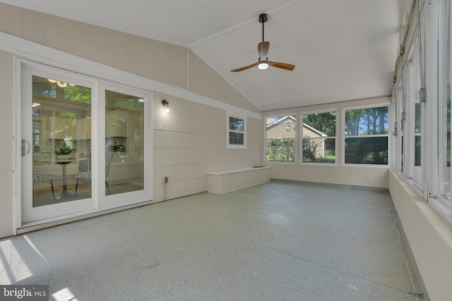 unfurnished sunroom featuring vaulted ceiling and ceiling fan