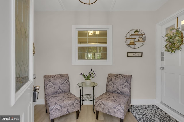 sitting room featuring wood finished floors