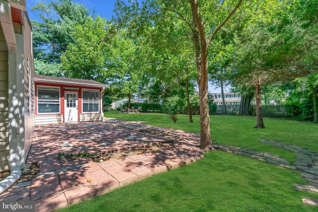 view of yard with a patio area and fence