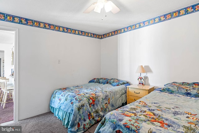 9400 Coastal Hwy Unit 1901, Ocean City, MD 21842 - carpeted bedroom featuring a textured ceiling and ceiling fan