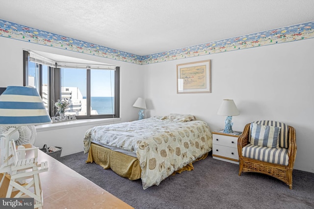 9400 Coastal Hwy Unit 1901, Ocean City, MD 21842 - bedroom featuring carpet floors and a textured ceiling